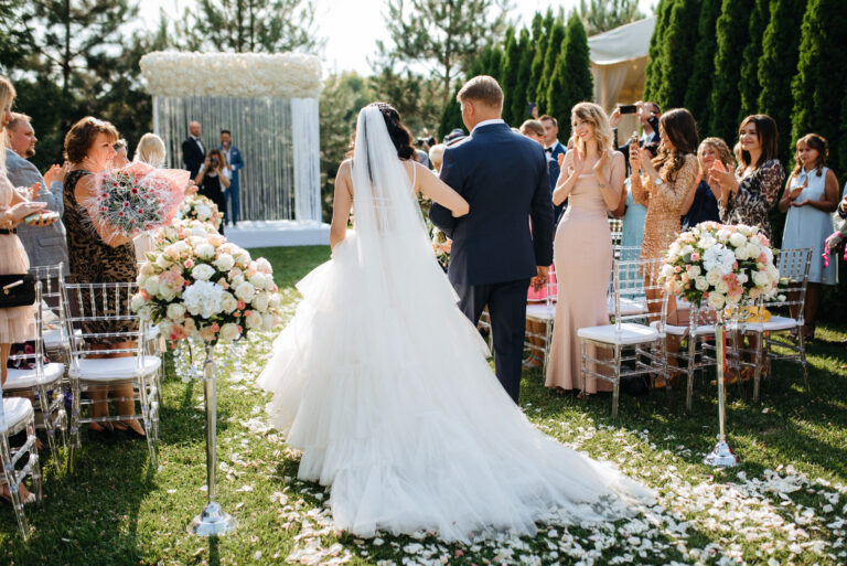 The newlyweds outdoor wedding ceremony in a open-air